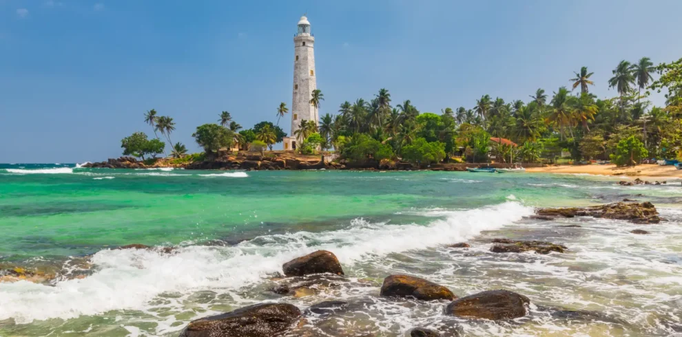white-lighthouse-dondra-head-and-tropical-palms-s-2026-03-16-04-36-06-utc